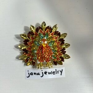 Turkey Brooch & Pendent, Signed JANU.   Fall array of colors.